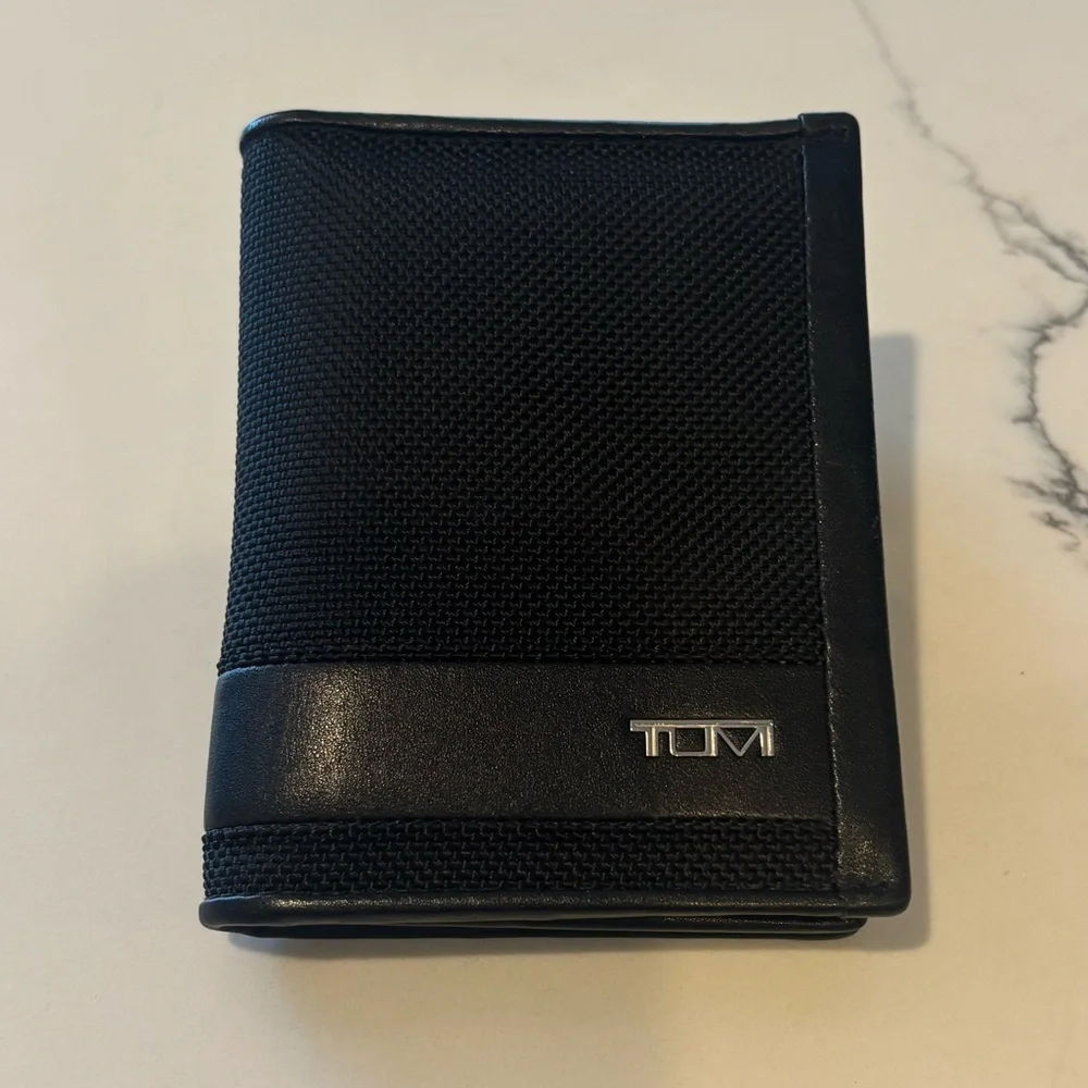 Tumi Black Textured Wallet new without tags in excellent condition